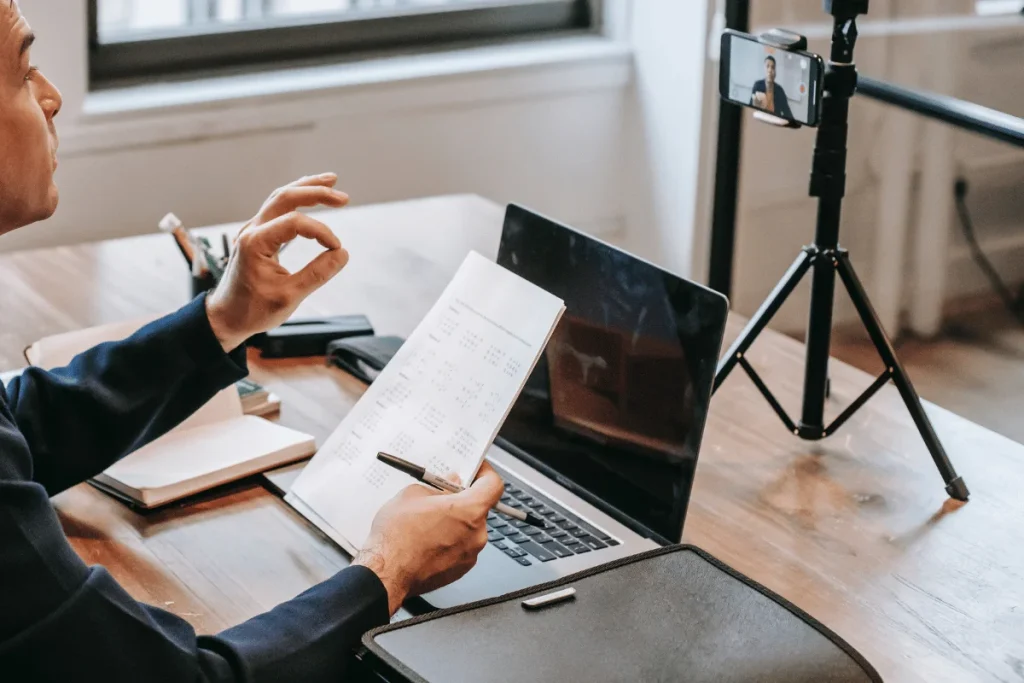 Executive hosting a webinar with detailed document explanation.