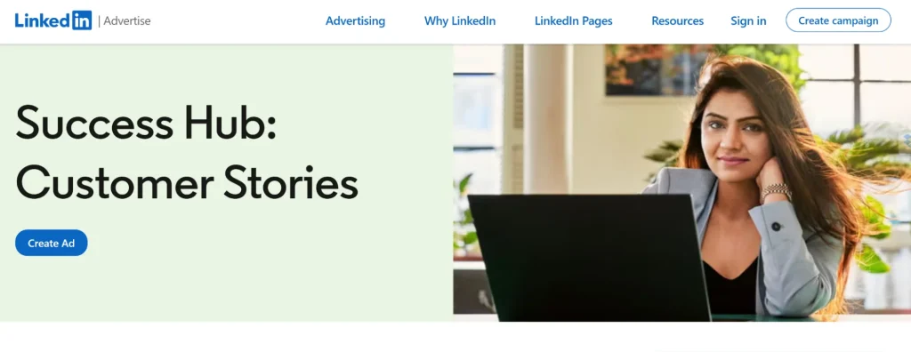 A woman with long hair sits confidently at a desk, looking at the camera with a slight smile. Text reads, "Success Hub: Customer Stories" on a light background.